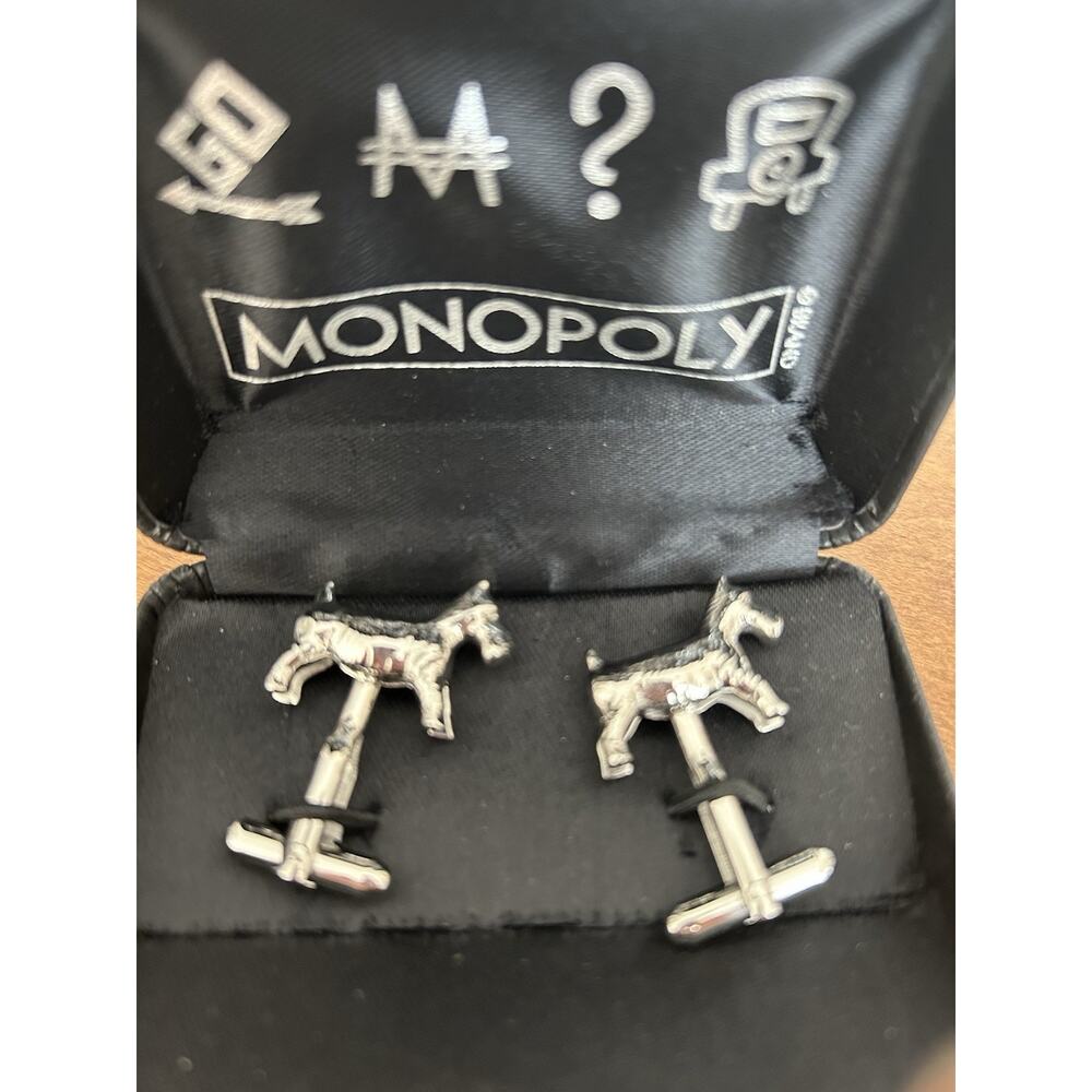 Officially licensed Monopoly Scotty Dog cuff links in stainless steel.